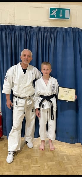 Students achieve their 1st Dan Black Belts!